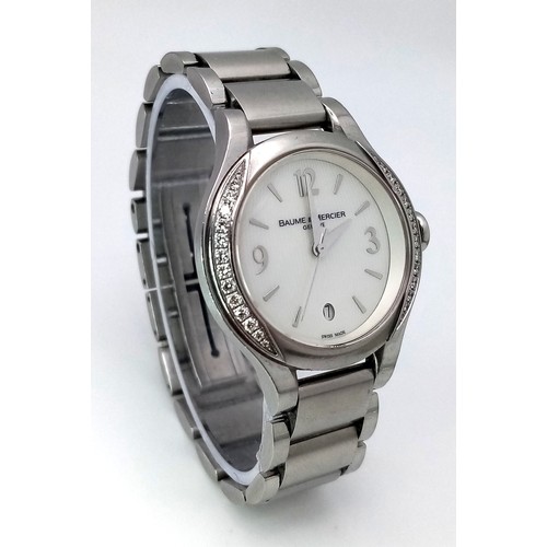 78 - A Baume and Mercier Diamond Quartz Ladies Watch. Stainless steel bracelet and case - 30mm. Diamond b... 