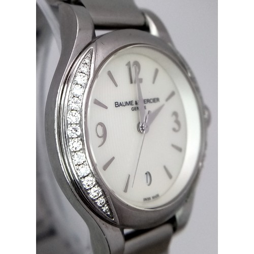 78 - A Baume and Mercier Diamond Quartz Ladies Watch. Stainless steel bracelet and case - 30mm. Diamond b... 