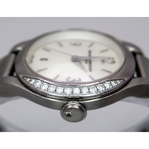 78 - A Baume and Mercier Diamond Quartz Ladies Watch. Stainless steel bracelet and case - 30mm. Diamond b... 