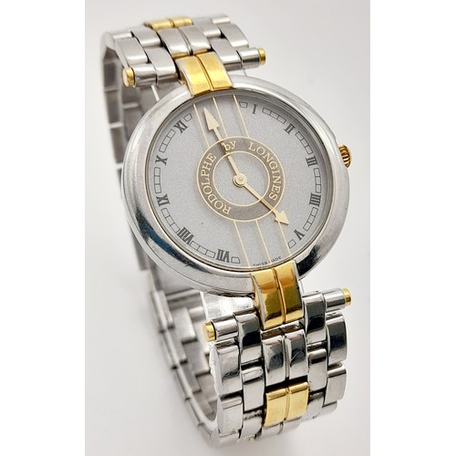 136 - A Longine Rodolph Quartz Gents Watch. Two tone bracelet and case - 33mm. Silver tone dial. In workin... 