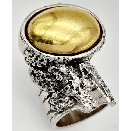 239 - A Designer Yves Saint Laurent Artistic Ring. Size N.