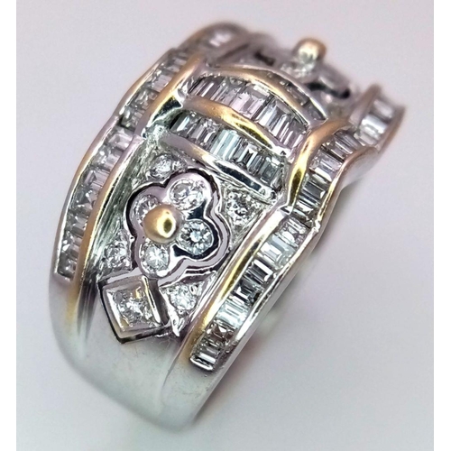 129 - An 18K White Gold Decorative Diamond Ring. Seventy Round and rectangular cut diamonds create an arti... 