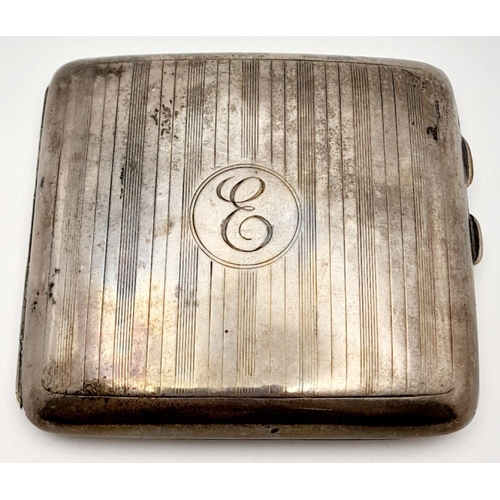 312 - An Antique Sterling Silver Cigarette Case. Gilded interior. Patinaed exterior with 'E' Initial Carto... 