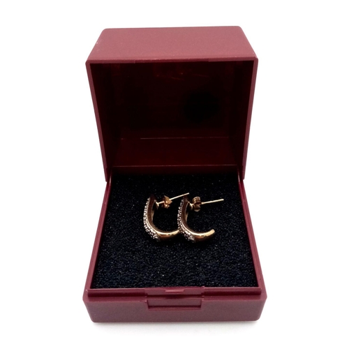 98 - Stunning Pair of 9 carat GOLD and DIAMOND EARRINGS. Both Earrings having a line of 8 x DIAMONDS to c... 