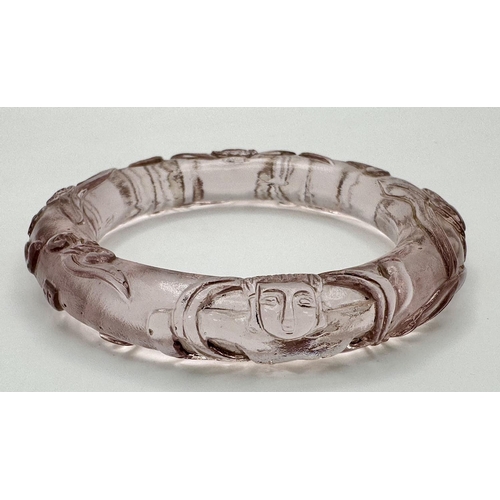 104 - A spectacular rock crystal bangle with exquisite Chinese hand carving in its original presentation b... 