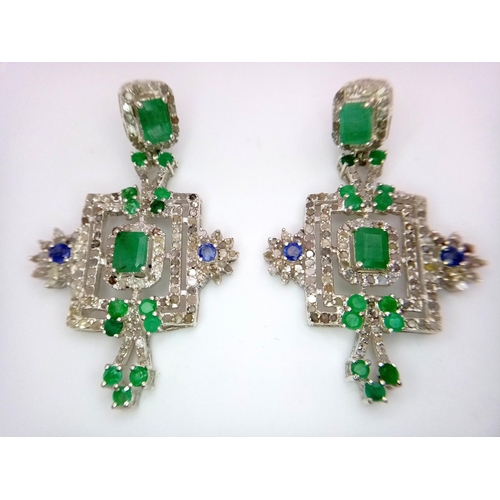 153 - An antique, regal, sterling silver pair of earrings with large emeralds and old cut diamonds, in a l... 