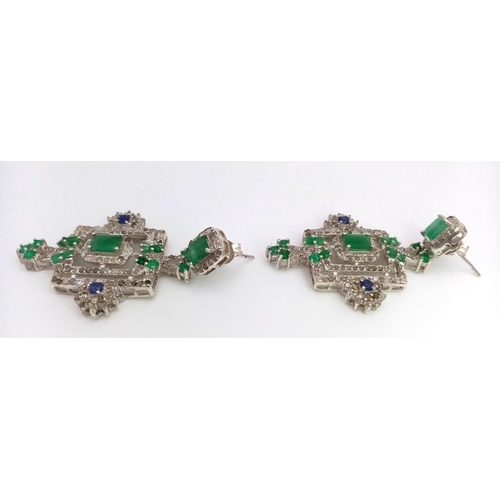 153 - An antique, regal, sterling silver pair of earrings with large emeralds and old cut diamonds, in a l... 