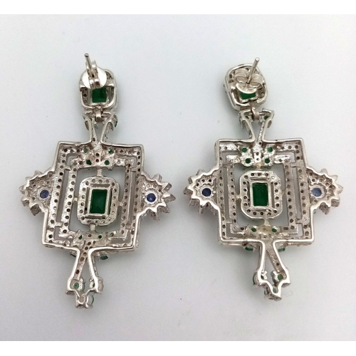 153 - An antique, regal, sterling silver pair of earrings with large emeralds and old cut diamonds, in a l... 