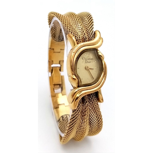 293 - A rare, vintage DIOR ladies watch, case 18 x 25 mm, with a unique fluid chain link bracelet (undamag... 