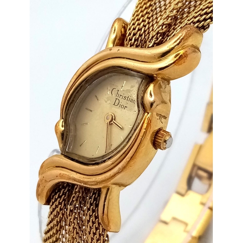 293 - A rare, vintage DIOR ladies watch, case 18 x 25 mm, with a unique fluid chain link bracelet (undamag... 