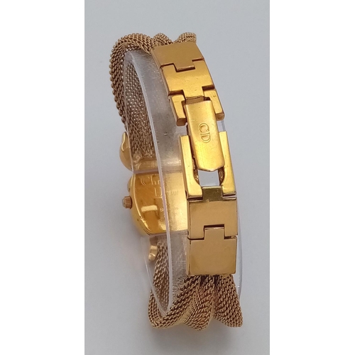 293 - A rare, vintage DIOR ladies watch, case 18 x 25 mm, with a unique fluid chain link bracelet (undamag... 