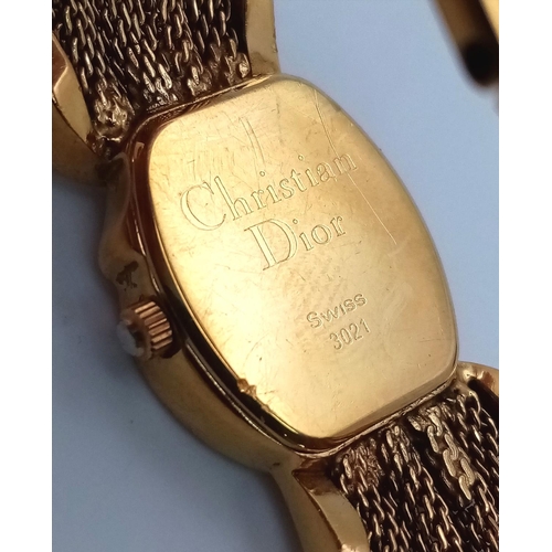 293 - A rare, vintage DIOR ladies watch, case 18 x 25 mm, with a unique fluid chain link bracelet (undamag... 