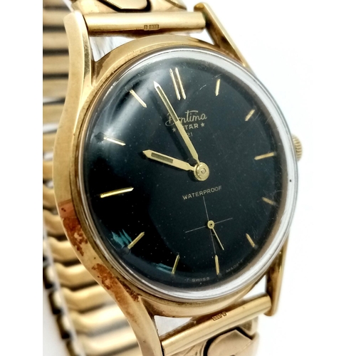 5 - A Vintage 9k Gold Cased Bentima Gents Watch. 21 jewels mechanical movement. Expandable gilded strap.... 