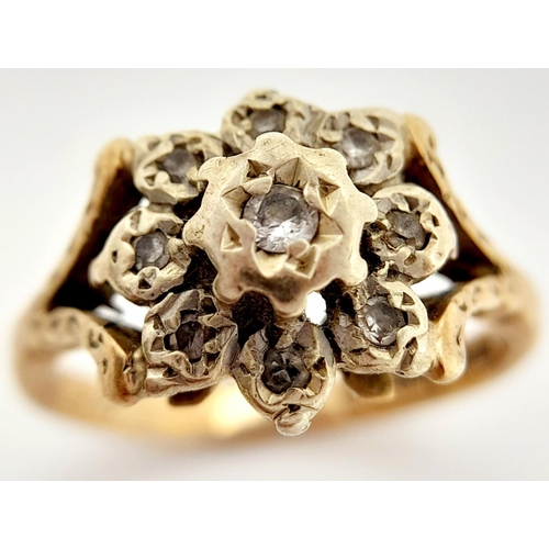 57 - A Vintage 9K Yellow Gold and Diamond Ring. Old cut diamonds in a floral decoration. Size L. 3.1g tot... 