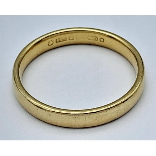 66 - An 18K Yellow Gold Band Ring. Size L. 3mm width. 2.9g