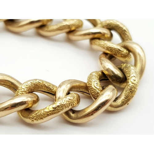 8 - A Vintage 9K Yellow Gold Curb Bracelet with Heart Clasp. Multiple hallmarks. 17cm. 16.14g