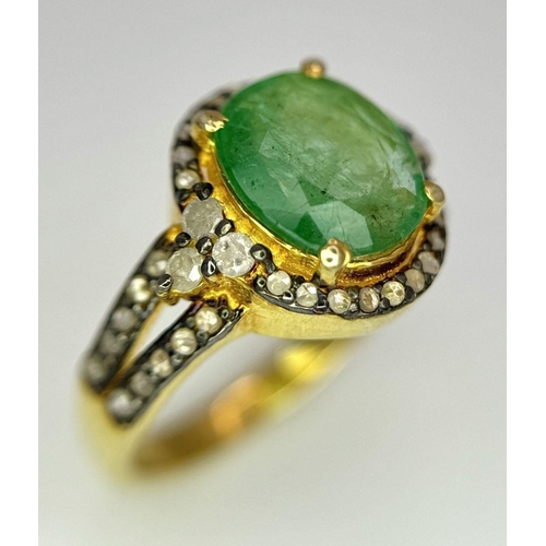 1400 - A 2ct Emerald ring with Diamond Accents. Set in gilded 925 Silver. Size K.