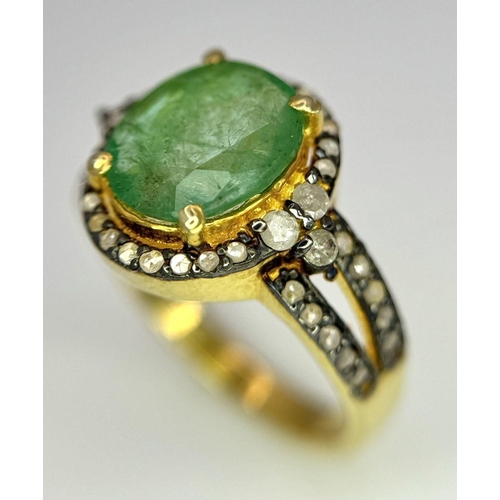 1400 - A 2ct Emerald ring with Diamond Accents. Set in gilded 925 Silver. Size K.