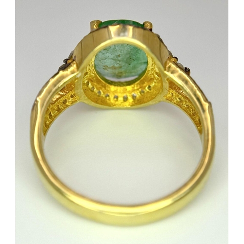 1400 - A 2ct Emerald ring with Diamond Accents. Set in gilded 925 Silver. Size K.