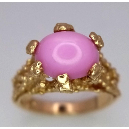 170 - A 14K Yellow Gold Star Sapphire Ring. A pink star sapphire in a claw setting. Size M. 6g total weigh... 