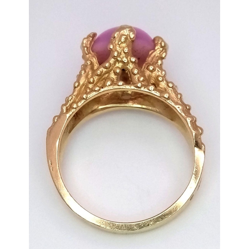 170 - A 14K Yellow Gold Star Sapphire Ring. A pink star sapphire in a claw setting. Size M. 6g total weigh... 