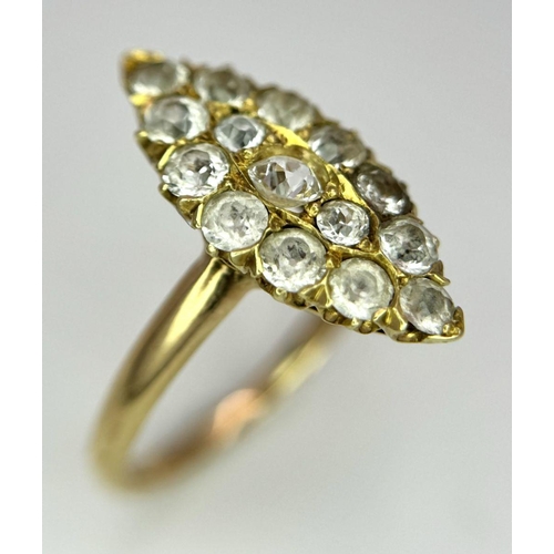 177 - An 18K Yellow Gold Diamond Ring. Marquise shape with 15 diamonds. Size K. 3.4g total weight.