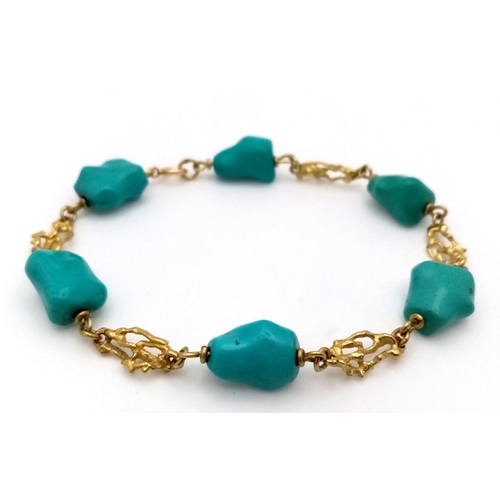 184 - A Natural Turquoise and 18K Gold Bracelet. 21cm. 18.4g total weight.