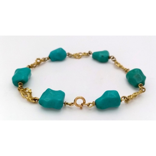 184 - A Natural Turquoise and 18K Gold Bracelet. 21cm. 18.4g total weight.