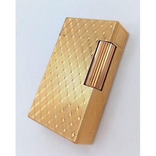 331 - A Vintage Dupont de Paris Gold Plated Flip Top Lighter. Beautiful geometric tooled decoration. Comes... 