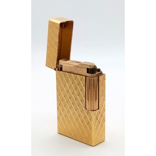 331 - A Vintage Dupont de Paris Gold Plated Flip Top Lighter. Beautiful geometric tooled decoration. Comes... 