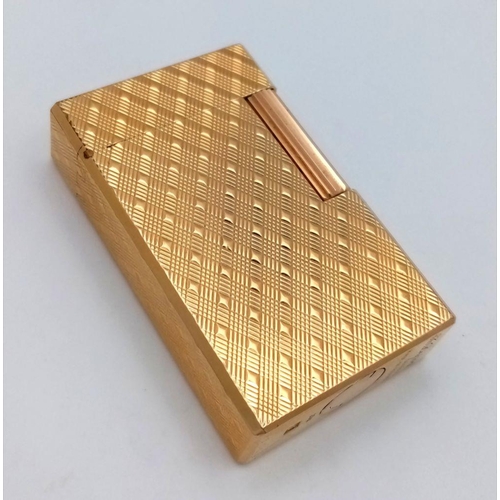 331 - A Vintage Dupont de Paris Gold Plated Flip Top Lighter. Beautiful geometric tooled decoration. Comes... 