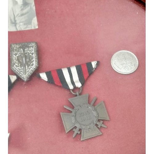 341 - Framed WW1 Imperial German Iron Cross 2nd class and Hindenburg Field Service Cross, along with a pho... 