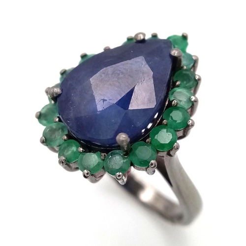 422 - A 10ct Blue Sapphire Ring with 1.70ctw of Emerald Accents. Set in 925 Silver. Size N. Comes with a p... 