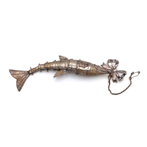 479 - A Large Antique Articulated Silver Fish Pendant hanging from an Antique Silver Bow Brooch. Fish - 12... 