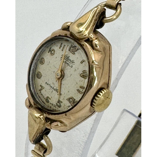 549 - At Atlantic 9K Gold Cased Ladies Watch. Mechanical movement. Works but because of age no guarantees.