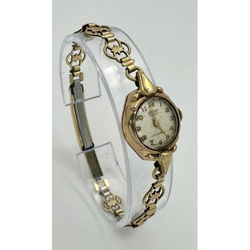 549 - At Atlantic 9K Gold Cased Ladies Watch. Mechanical movement. Works but because of age no guarantees.