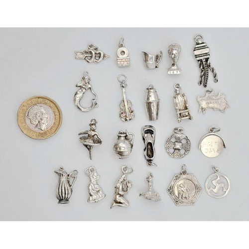 570 - A Selection of 21 Silver Assorted Charms. 41g total weight. Ref: 62001