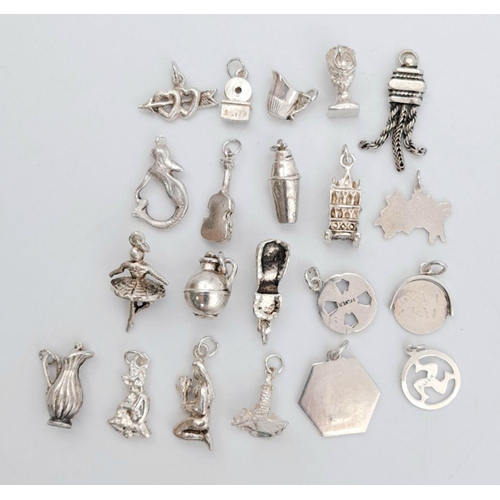 570 - A Selection of 21 Silver Assorted Charms. 41g total weight. Ref: 62001