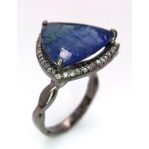 576 - An 11.25ct Tanzanite Gemstone Ring with 0.35ctw of Diamond Accents. Set in 925 Silver. Comes with a ... 