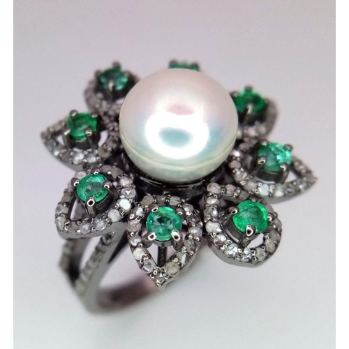 80 - A 4.5ct Freshwater Pearl Ring with a 0.90ctw Diamond and 0.70ctw Emerald Halo. The perfect flower! S... 