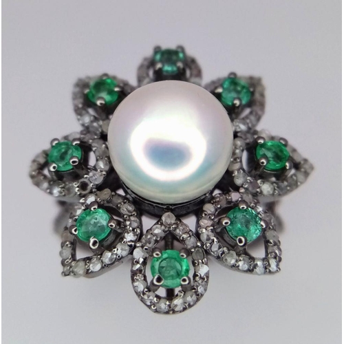 80 - A 4.5ct Freshwater Pearl Ring with a 0.90ctw Diamond and 0.70ctw Emerald Halo. The perfect flower! S... 