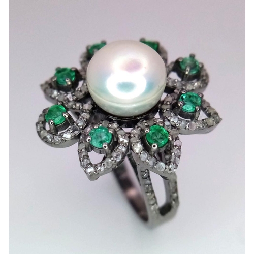 80 - A 4.5ct Freshwater Pearl Ring with a 0.90ctw Diamond and 0.70ctw Emerald Halo. The perfect flower! S... 