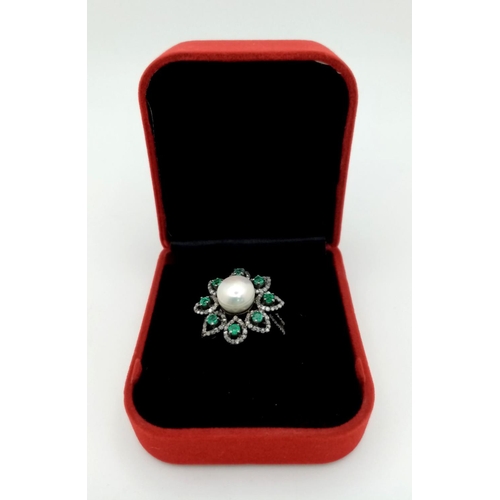 80 - A 4.5ct Freshwater Pearl Ring with a 0.90ctw Diamond and 0.70ctw Emerald Halo. The perfect flower! S... 