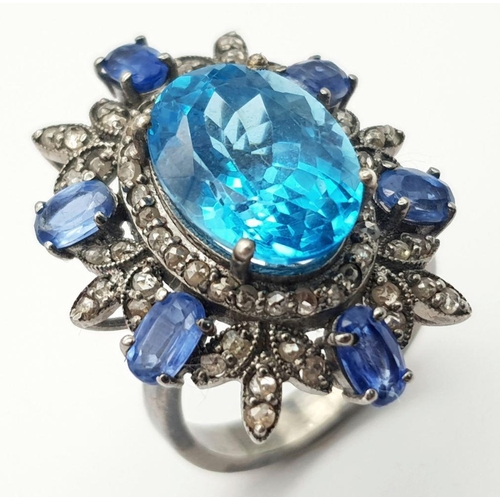 94 - A Mesmerising 6ct London Blue topaz Gemstone ring with Kyanite and Diamond Accents - 1.2ctw. Size M ... 