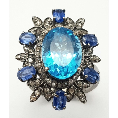 94 - A Mesmerising 6ct London Blue topaz Gemstone ring with Kyanite and Diamond Accents - 1.2ctw. Size M ... 