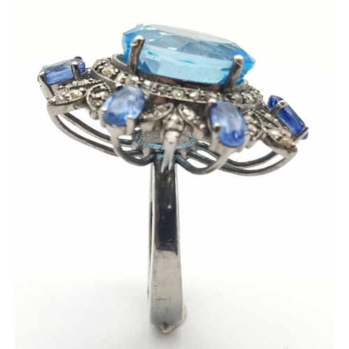 94 - A Mesmerising 6ct London Blue topaz Gemstone ring with Kyanite and Diamond Accents - 1.2ctw. Size M ... 