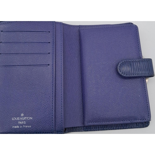 559 - A Vintage Louis Vuitton Blue Bifold Wallet. Epi leather exterior with silver-toned hardware and pres... 