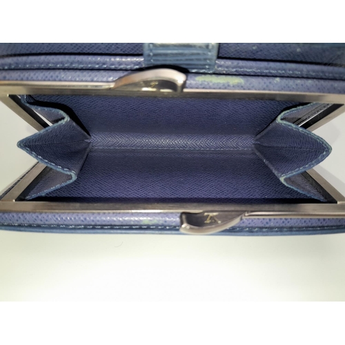 559 - A Vintage Louis Vuitton Blue Bifold Wallet. Epi leather exterior with silver-toned hardware and pres... 