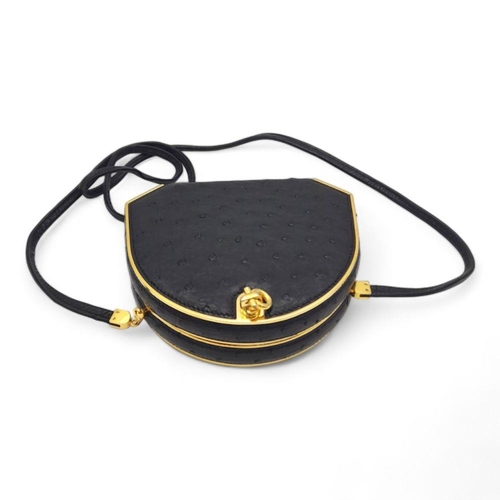 122 - An Asprey of London Black Ostrich Shoulder Bag. Comes with original Asprey box and mirror. Gilded ha... 