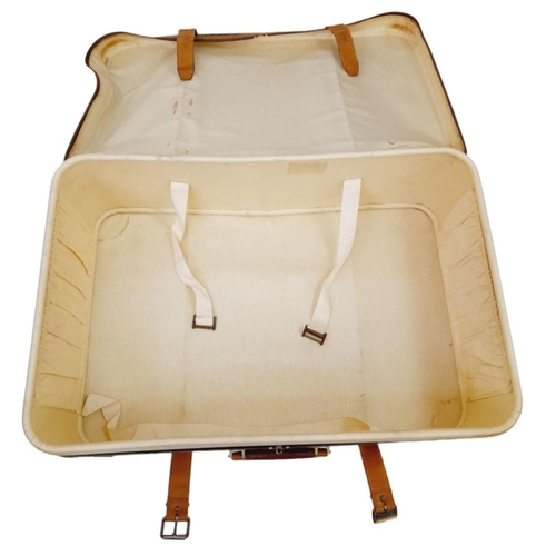 346 - A Louis Vuitton Vintage Large Suitcase. Monogrammed canvas exterior with leather trim, gold-toned ha... 